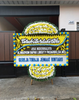 Papan Bunga Duka di Kombos Timur