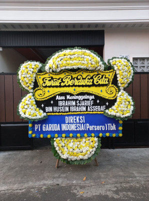 Papan Bunga Duka di Kombos Timur